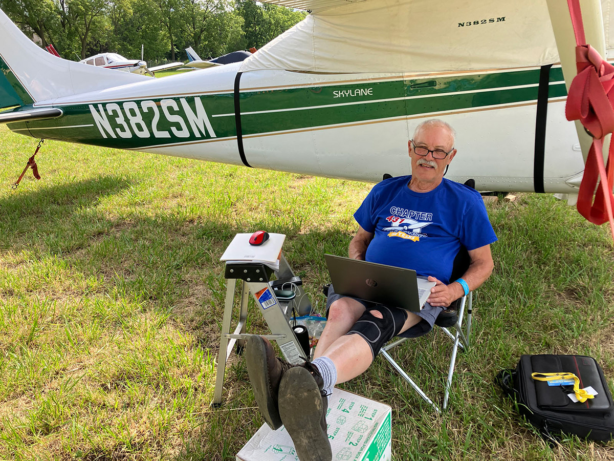 planes on grassy field