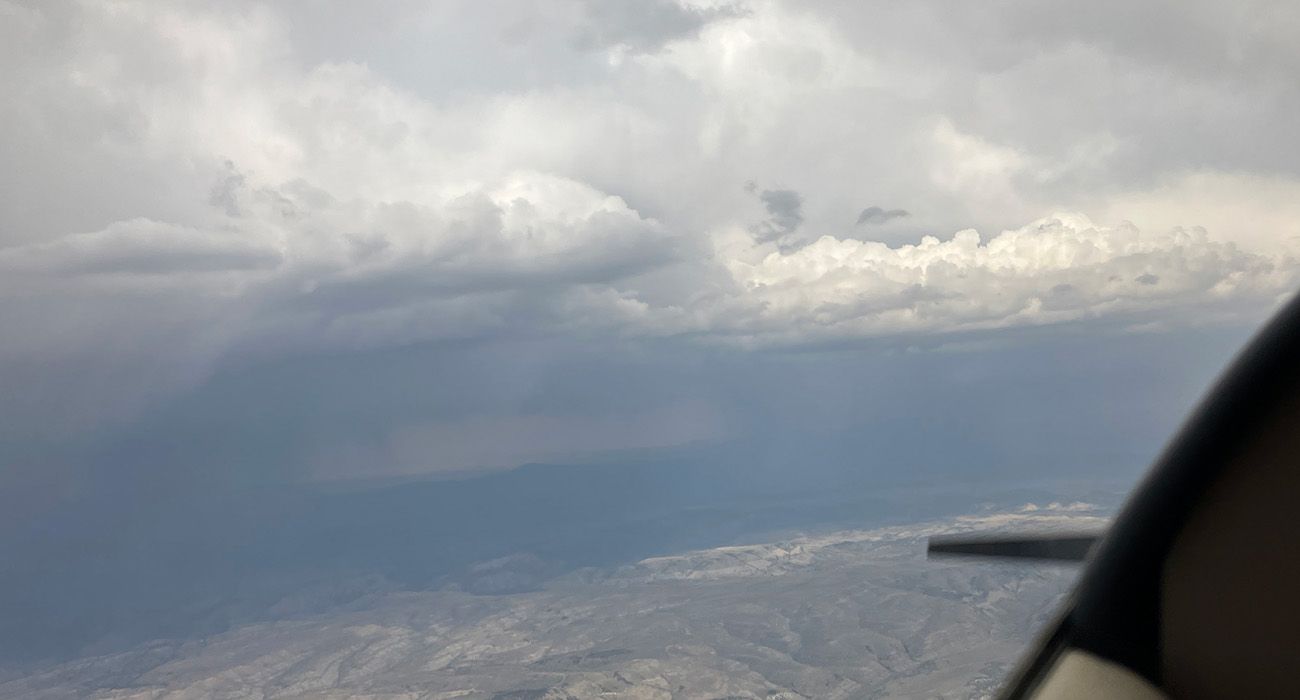 view of cloudy skies from cessna